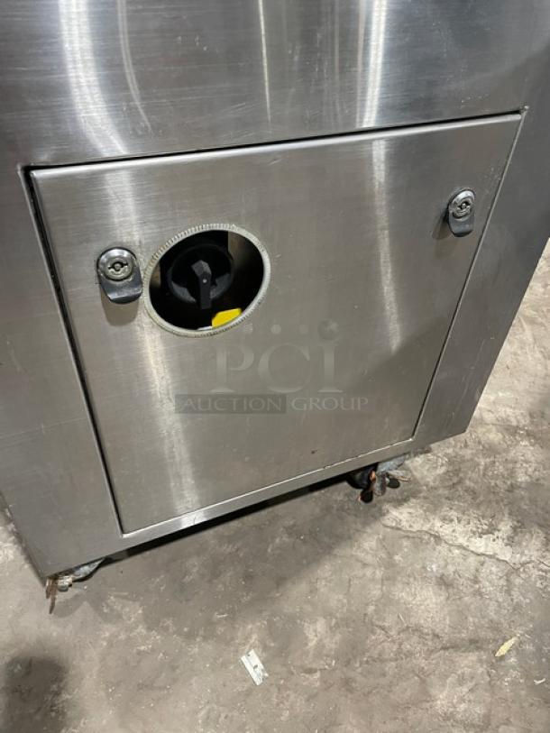 Promax stainless steel vacuum tray sealer with digital controls, on casters. Single chamber, electric-powered, working condition.