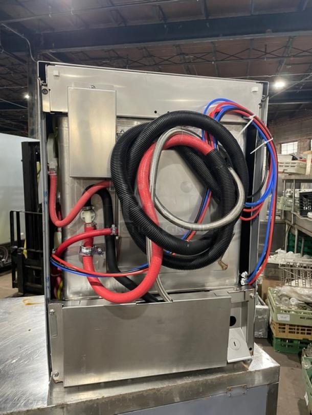 Hobart Advansys LXNR commercial dishwasher, stainless steel, rear view showing hoses and connections, Energy Star certified.