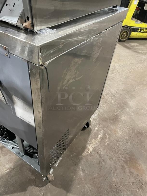 Atosa MGF8403 commercial stainless steel 2-door undercounter refrigerator, 2016 model, Energy Star certified, on casters, visible wear.