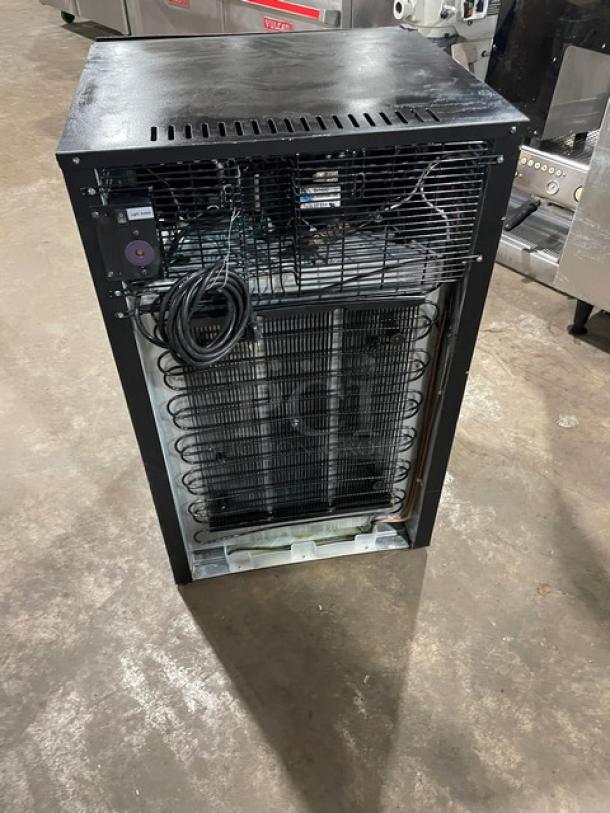 IDW.Global G6CB black countertop beverage merchandiser fridge, single glass door, Energy Star certified, with wired rack, open back view.