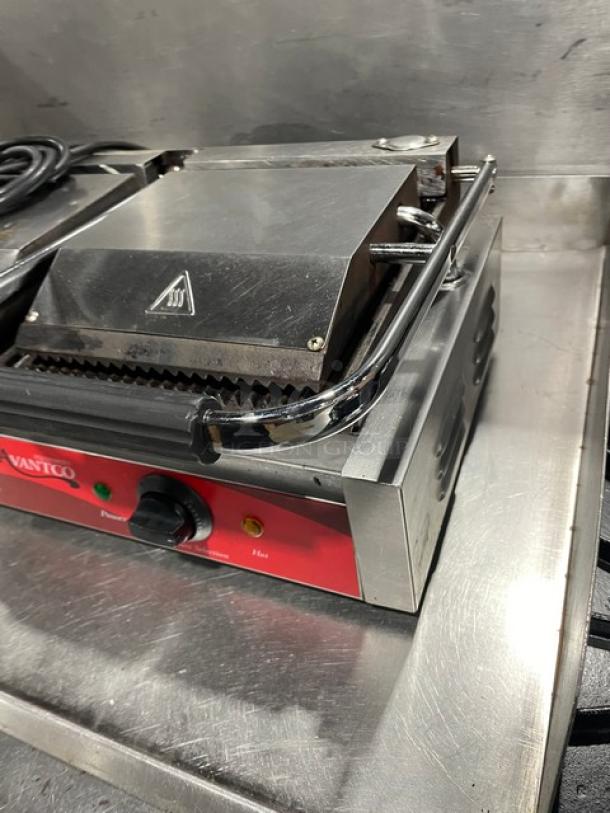 Avantco Commercial Stainless Steel Dual Panini Grill with thermostatic control, grooved grates, electric powered, countertop model.