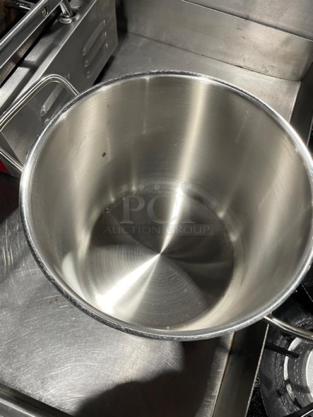 Brand new Vollrath Optio Series 8 Qt. stainless steel induction-ready stock pot, model 3501, with lid and handles.