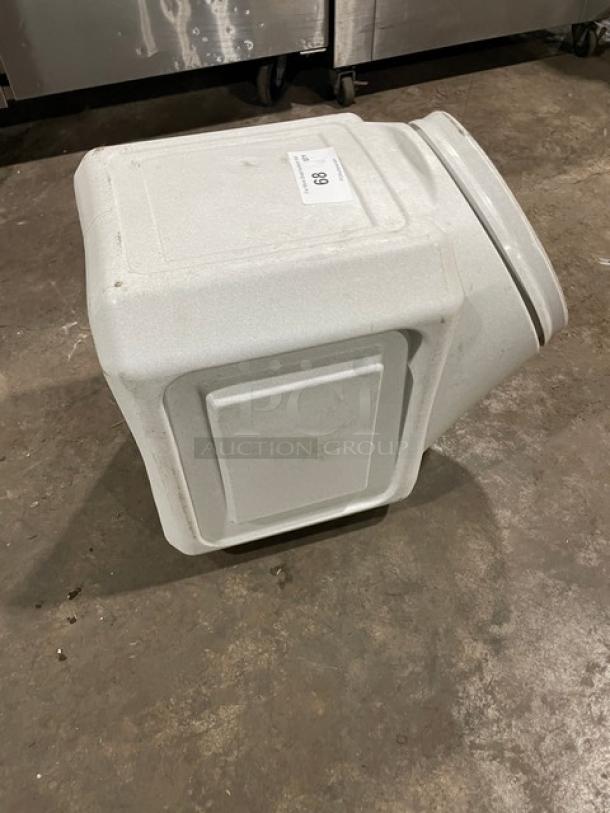 Commercial stackable countertop ingredient bin with twist-off top, used condition, white, labeled "89" on the side.
