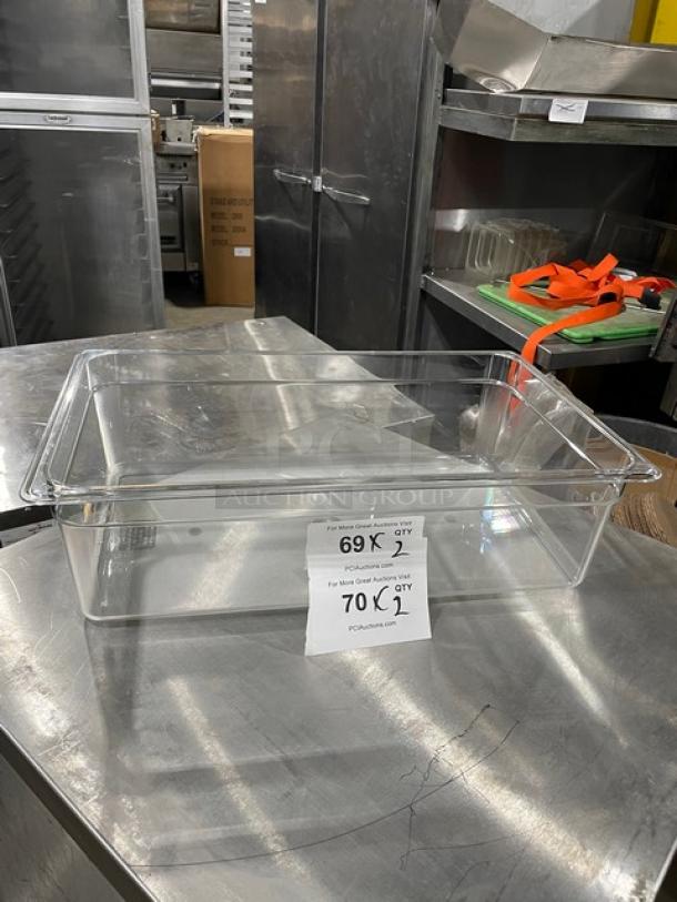 Cambro Commercial Clear Polycarbonate Food Pan, new condition, shown on a metal table with auction label indicating lot details.