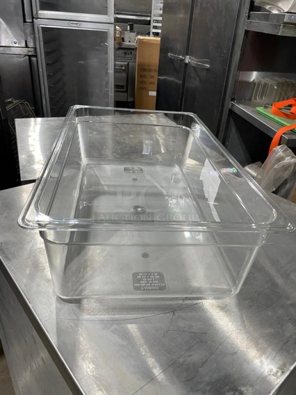 New Cambro clear polycarbonate food pan on metal countertop, labeled with brand and specifications, excellent condition.