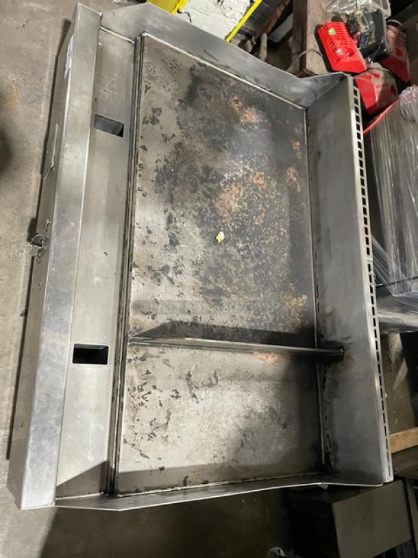 WoodStone WS-PL-4836-4-CT stainless steel griddle with back and side splash, natural gas-powered, countertop model, used condition.