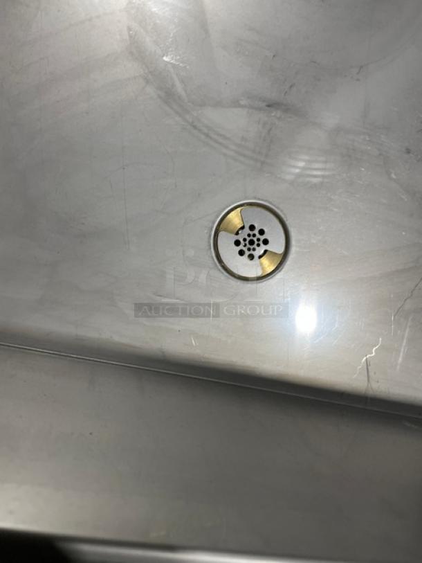 Hatco CWBX-2 stainless steel refrigerated drop-in cold unit detail, showing clean surface and visible drain. Model: CWBX-2.