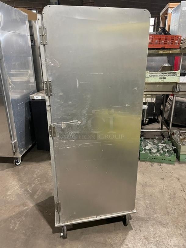 Lockwood CA72RR18SR display/transport cabinet, silver, clear half door, built-in pan slides, on casters, good condition.