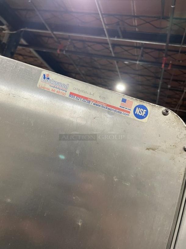 Lockwood CA72RR18SR commercial cabinet, NSF certified, label showing brand details, scratches visible, on casters.