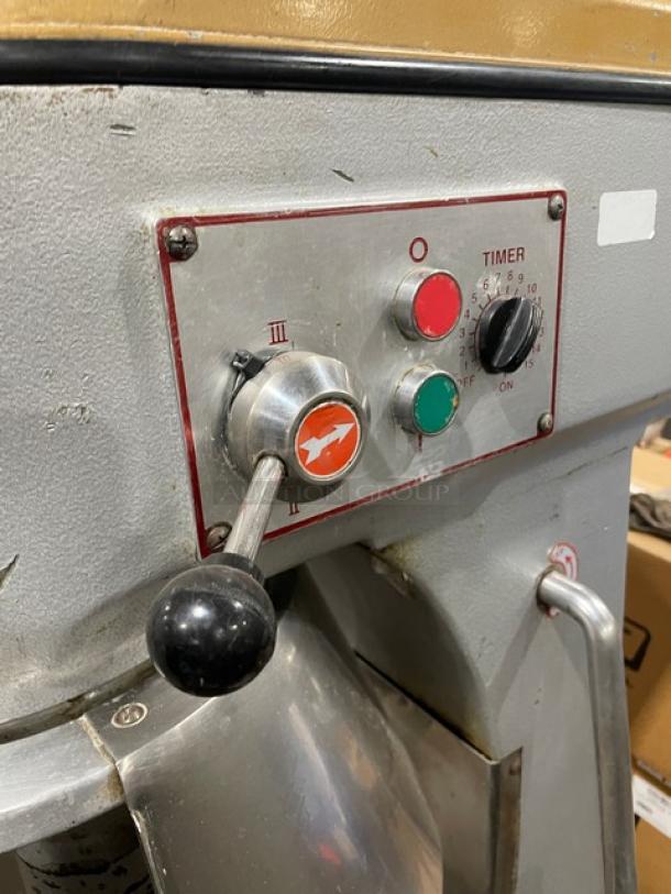 Commercial electric powered heavy-duty planetary mixer, Model MIX8140, SN: 71864, 220V, 1 phase, timer controls visible.