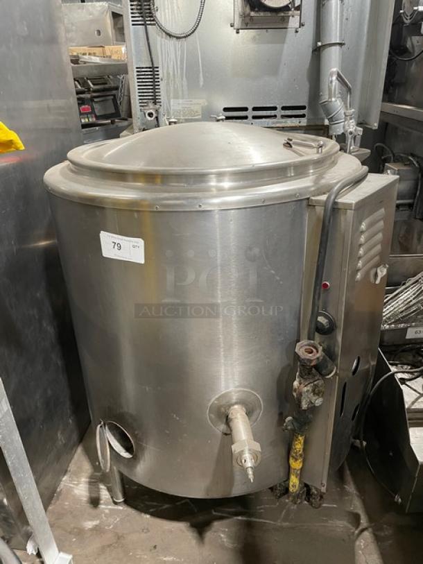 Groen AH/1-40 40 Gal. stainless steel steam jacketed kettle, natural gas-powered, with swing spout faucet, on legs.