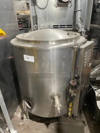 Groen AH/1-40 40 Gal. stainless steel steam jacketed kettle, natural gas-powered, with swing spout faucet, on legs.
