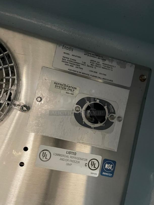 Delfield Enodis Series 406STAR2 stainless steel refrigerator control panel with model and certification labels.