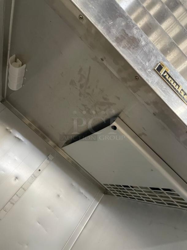 Traulsen ARI134LUT-FHS commercial stainless steel roll-in refrigerator, solid single door, 115V, features internal cooling system.