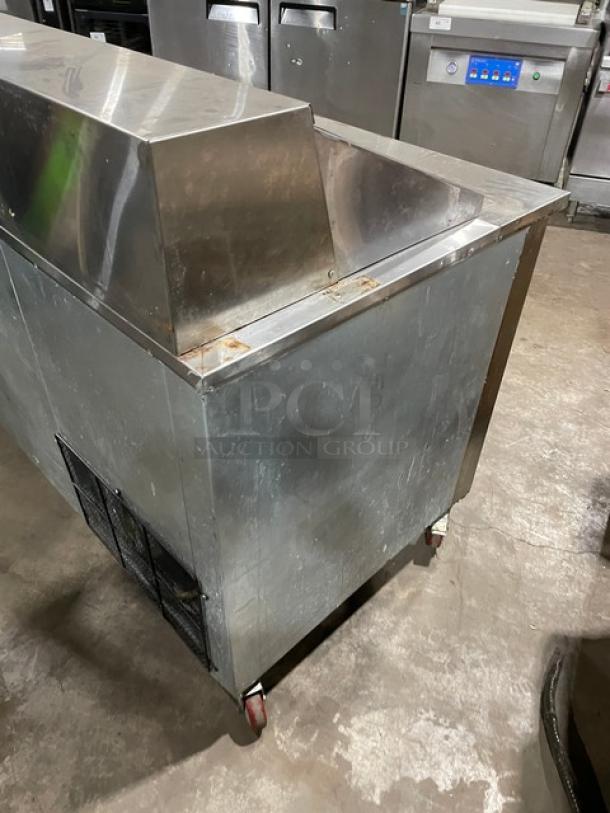 CoolTech CTR60BM stainless steel 2-door refrigerated bain marie prep table on casters. Poly coated wired rack included.