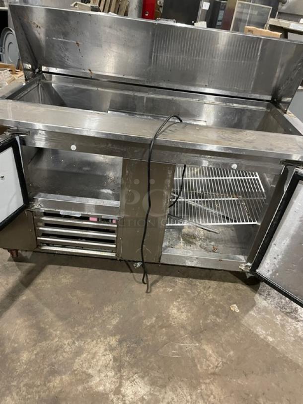 CoolTech 2021 stainless steel 2-door refrigerated prep table, Model CTR-60BM, with poly-coated rack and casters, 120V.