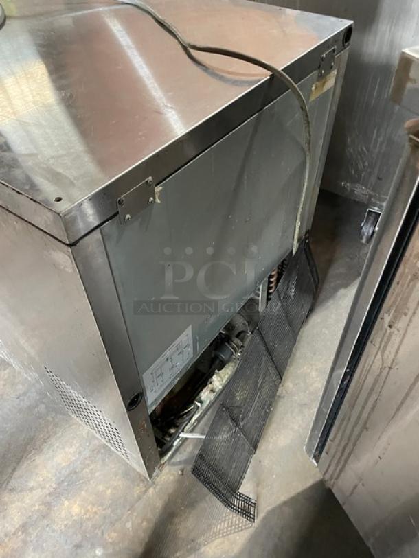 Turbo Air M3 Series stainless steel undercounter refrigerator, single door, visible wear, components exposed, model plate attached.