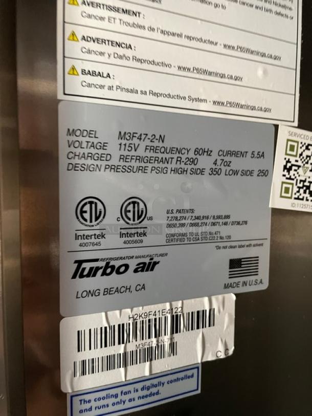 Turbo Air M3F47-2-N commercial stainless steel 2-door freezer, Energy Star certified, poly-coated rack, 115V, SN: H2K9F41E4122.