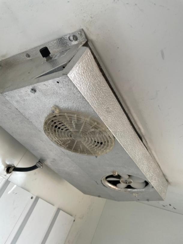 Leer Commercial Ice Merchandiser Freezer, Model IS67AG50, featuring metal fan and vent system, SN: 95H04710, 115V power.