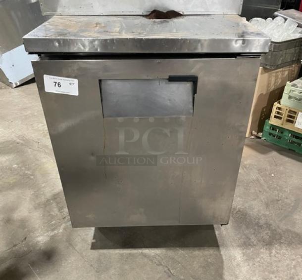 True Commercial Stainless Steel Undercounter Refrigerator, Model TUC-27, with chrome wired rack, on casters, used condition.