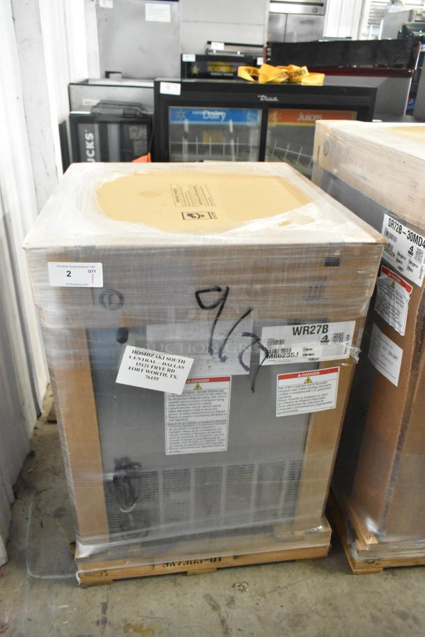 Brand new Hoshizaki WR27B stainless steel single-door work top cooler in packaging, 115 volts, 1 phase, with visible labels and markings.
