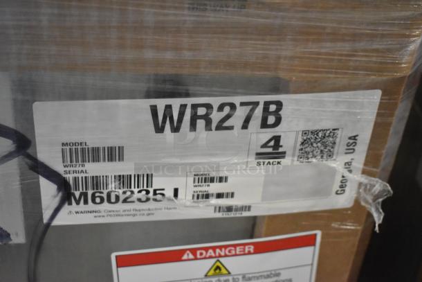 BRAND NEW Hoshizaki WR27B stainless steel single door cooler, 115V, 1 phase. Scratch and dent condition. Model and serial labels visible.