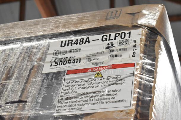Brand new Hoshizaki UR48A-GLP01 stainless steel undercounter cooler in box, 115V, 1 phase, serial L50094H. Warning label visible.