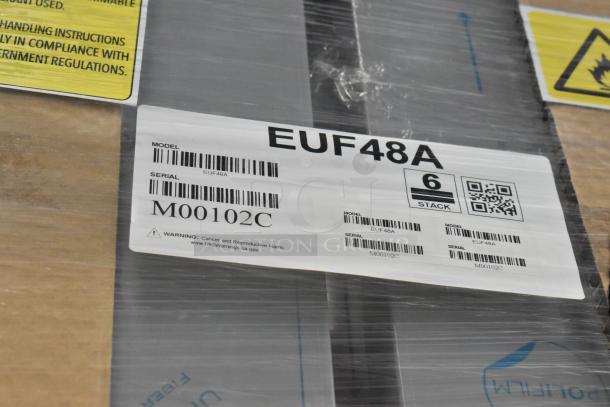 Brand new in box Hoshizaki EUF48A stainless steel commercial undercounter freezer. Model and serial label visible.
