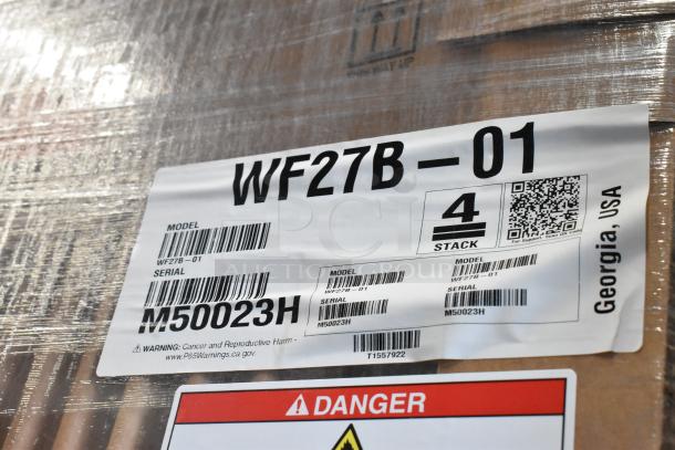 New Hoshizaki WF27B-01 stainless steel work top freezer, 115V, 1 phase, in box. Label shows model, serial number M50023H.