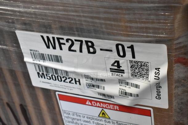 Brand new Hoshizaki WF27B-01 stainless steel commercial freezer, single door. Model number visible on packaging.