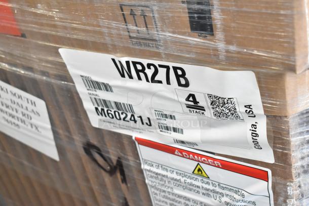Brand new Hoshizaki WR27B stainless steel work top cooler in box, displaying model and serial numbers on packaging label.