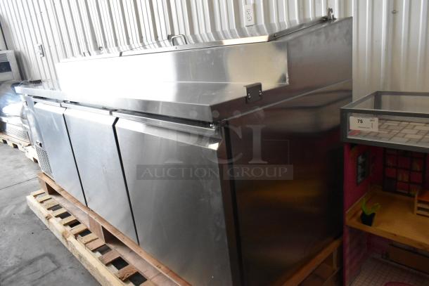 Brand new 2024 Avantco 178SSPPT3 stainless steel commercial pizza prep table, 115 volts, 1 phase, with minor scratches.