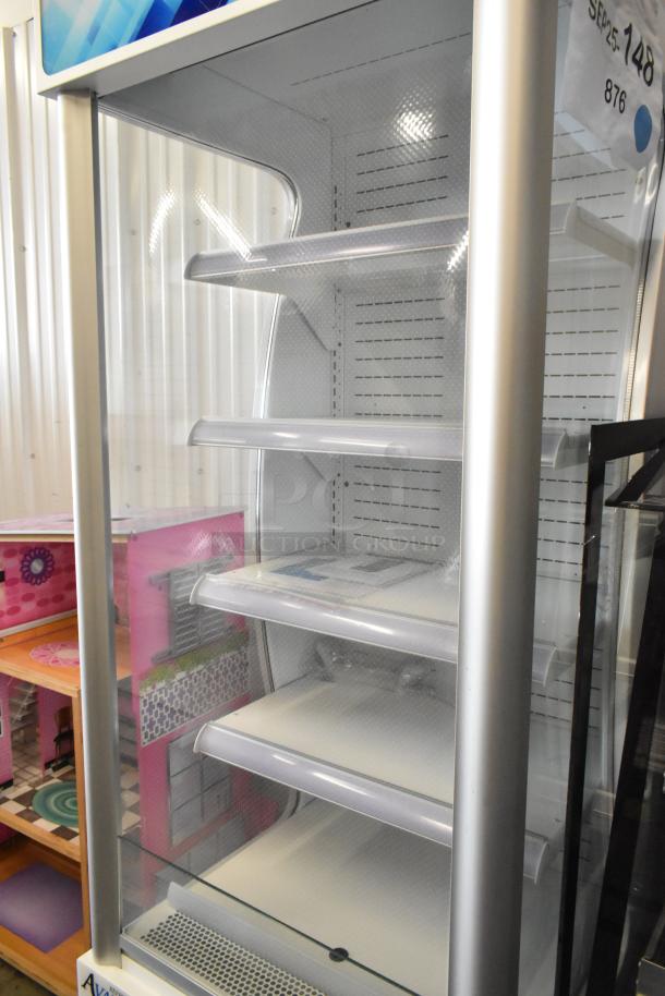 Brand new Avantco WVAC-28HC 28" white refrigerated air curtain merchandiser, 115V, 1 phase, with shelving.