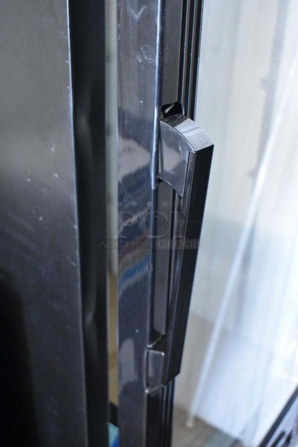 Avantco 178GDC23HCB metal reach-in cooler handle, brand new with minor scratches, single door, poly coated racks, on casters.