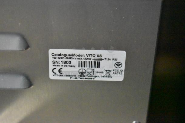 Label on Vito XS fryer oil filter system, 100-120V, 1200W, serial number 1803, made in Germany. CE and RoHS compliant.