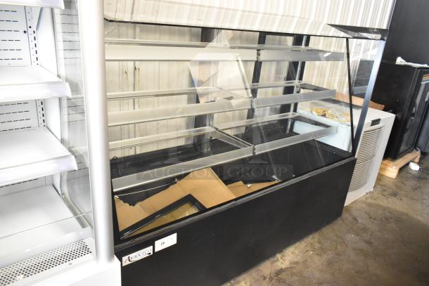 Brand new Avantco 193BCFD72B 70 7/8" black dry bakery display case with LED lighting, 115V, 1 Phase, scratch and dent.