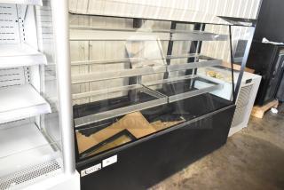 Brand new Avantco 193BCFD72B 70 7/8" black dry bakery display case with LED lighting, 115V, 1 Phase, scratch and dent.