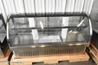 2023 Vollrath RDE7160 60" refrigerated display cabinet, brand new, curved glass, 120V, with minor scratches and dents.