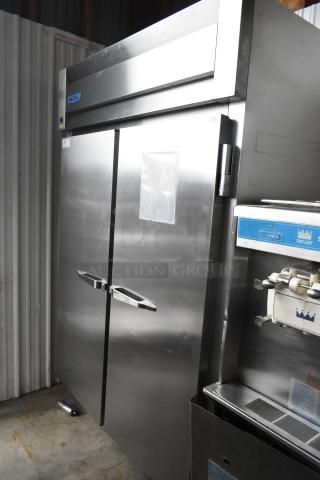 McCall 4-4045F stainless steel 2-door reach-in freezer with poly-coated racks, 115V, 1 phase, in good condition.