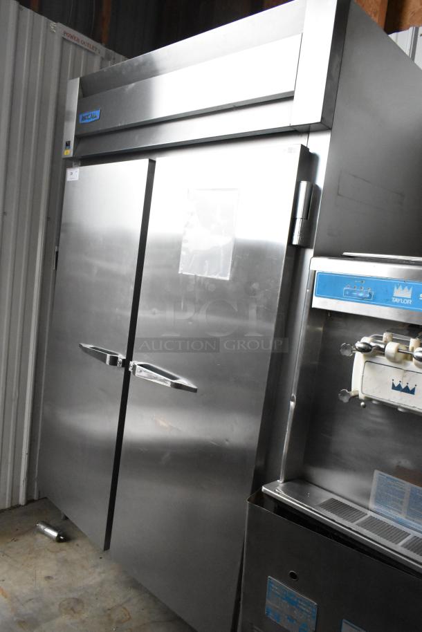 McCall 4-4045F stainless steel commercial 2-door reach-in freezer, poly coated racks, 115V, 1 phase, excellent condition.