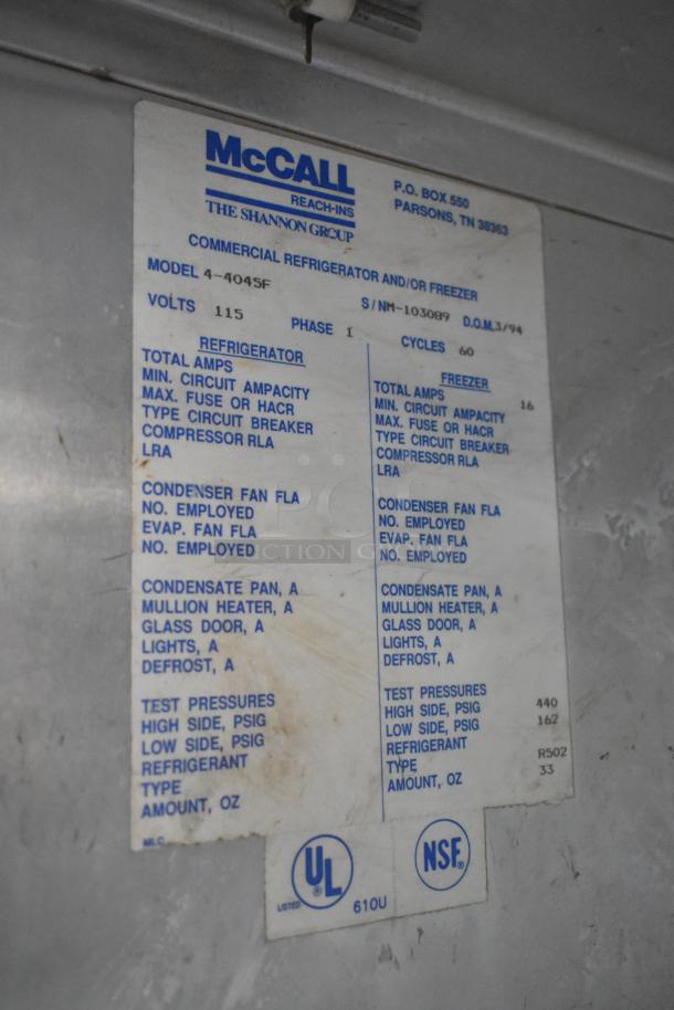 Label on McCall 4-4045F Stainless Steel Commercial 2 Door Reach In Freezer. Details include 115 Volts, 1 Phase, UL, NSF certified.