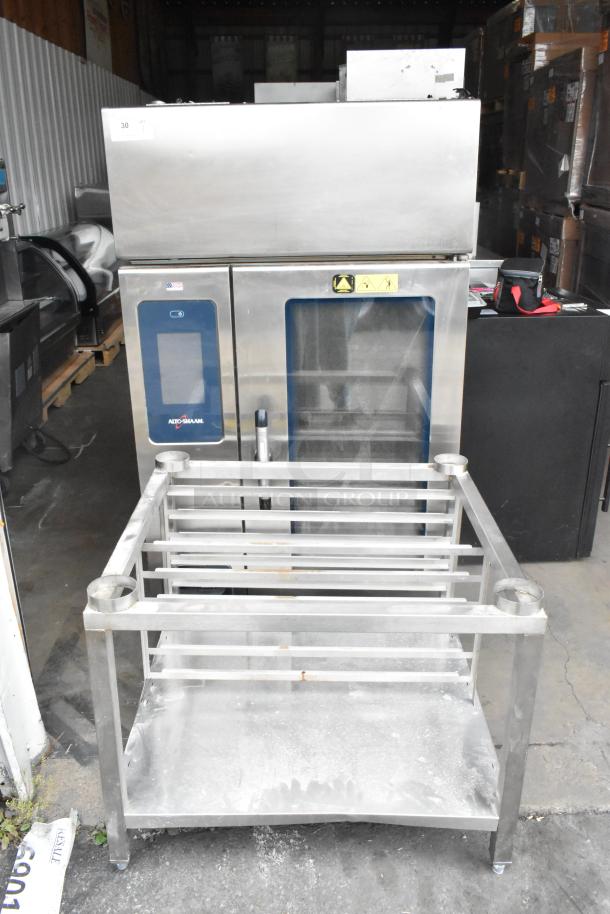 2018 Alto Shaam CTP10-10EVH stainless steel combi oven, ventless hood, stand. 208/240V, 3 phase. Good condition.
