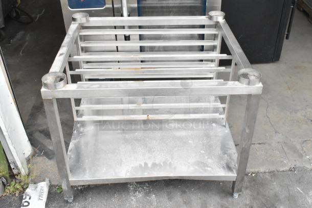 Stainless steel equipment stand for Alto Shaam CTP10-10EVH combi oven, shows light wear.