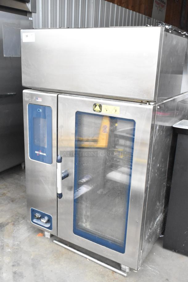 2018 Alto Shaam CTP10-10EVH stainless steel combi convection oven, ventless hood, equipment stand, good condition.