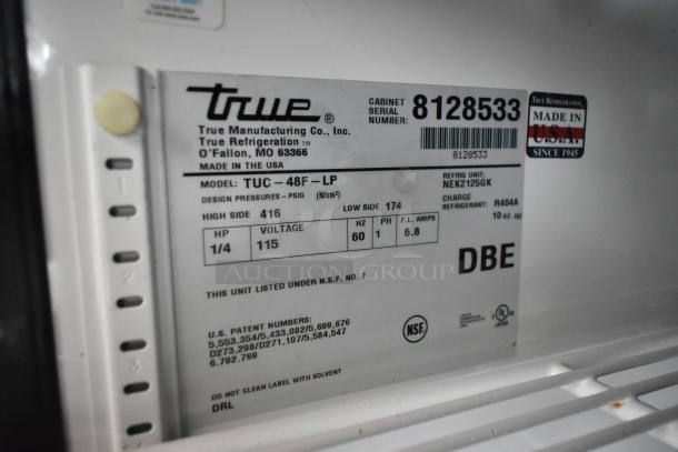 True TUC-48F-LP undercounter freezer label showing model, voltage 115V, phase 1, serial 8128533, Made in USA.