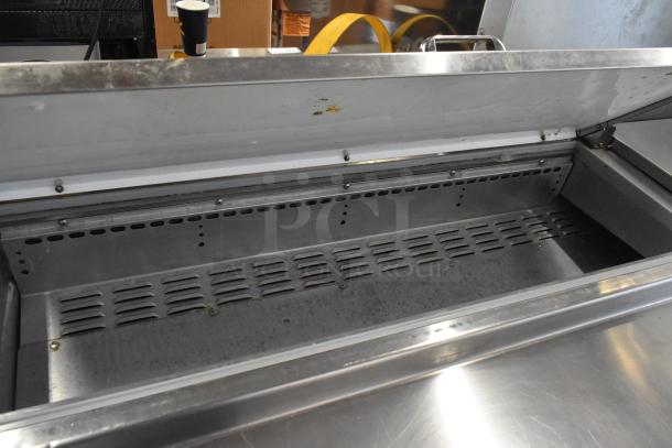 2016 Continental CPA93 stainless steel pizza prep table, good condition, commercial casters, 115 Volts, 1 Phase.