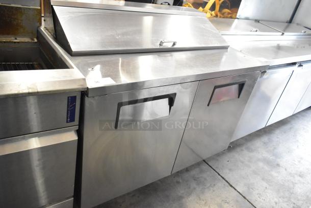 True TSSU-48-12 stainless steel sandwich salad prep table with bain marie mega top, on casters, 115V, 1 phase.