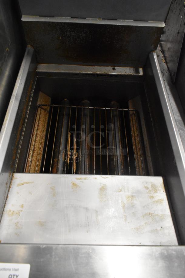 2021 Rocket Cooking RCPFR40G-CB stainless steel natural gas deep fat fryer, floor style, commercial use, interior view.