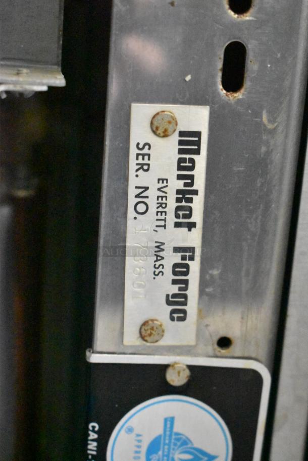 Market Forge 3500 steam cabinet, stainless steel, natural gas, 170,000 BTU, serial number 173601, on M24GIA generator.