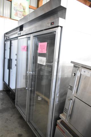 Hobart DA2-5 stainless steel commercial 2-door reach-in cooler, 115 volts, good condition, visible signs on doors.